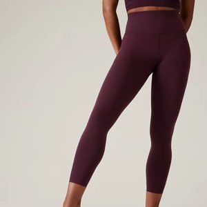 Athleta Salutation Stash pocket 7/8 Tight
